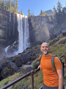 Oshyan standing in front of Vernal Falls in Yosemite, CA